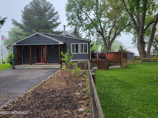 157 Taylors Mills Rd, Englishtown, NJ 07726 - view of front of property with a wooden deck and covered porch