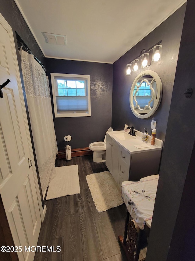 157 Taylors Mills Rd, Englishtown, NJ 07726 - bathroom with wood finished floors, vanity, toilet, and a shower with shower curtain