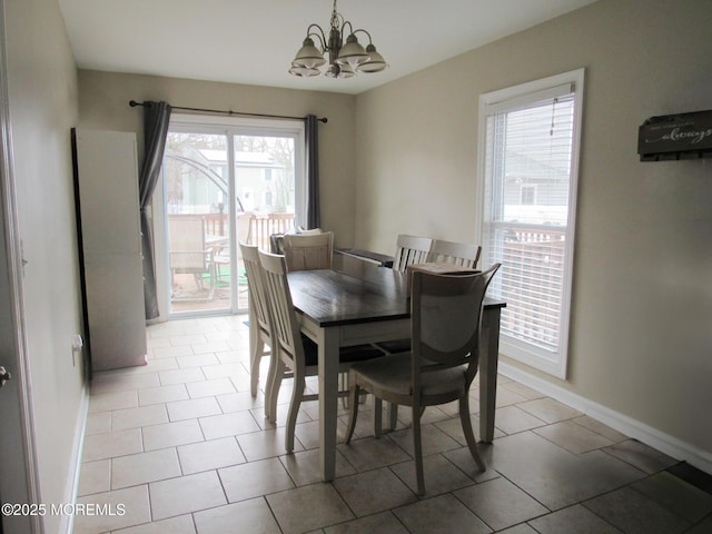 313 Merrimac Rd, Forked River, NJ 08731 - tiled dining room with a chandelier and baseboards