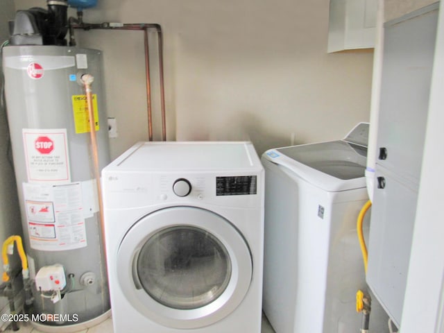 313 Merrimac Rd, Forked River, NJ 08731 - laundry room featuring gas water heater and washing machine and clothes dryer