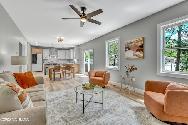 7 Cardinal Ave, Brick, NJ 08724 - living area featuring plenty of natural light, ceiling fan, light wood-style flooring, recessed lighting, and baseboards