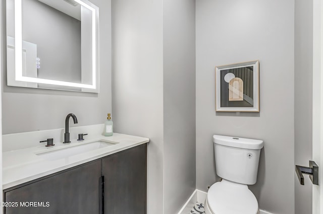 7 Cardinal Ave, Brick, NJ 08724 - half bath featuring toilet, vanity, and baseboards