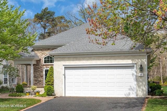 28 Pierhead Dr, Barnegat, NJ 08005 - view of front of property featuring roof with shingles, stone siding, asphalt driveway, and stucco siding
