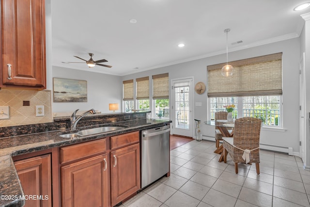 28 Pierhead Dr, Barnegat, NJ 08005 - kitchen with dishwasher, a sink, healthy amount of natural light, brown cabinetry, and ornamental molding