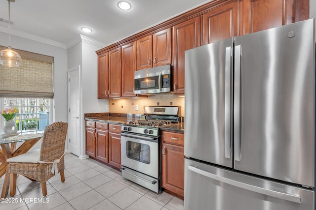 28 Pierhead Dr, Barnegat, NJ 08005 - kitchen with stainless steel appliances, crown molding, light tile patterned floors, recessed lighting, and decorative light fixtures