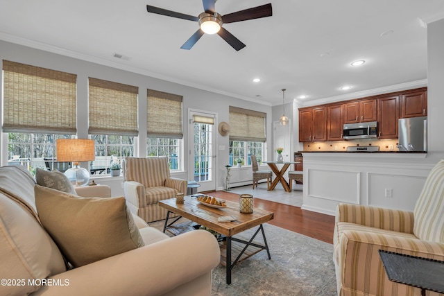 28 Pierhead Dr, Barnegat, NJ 08005 - living room with crown molding, a ceiling fan, light wood finished floors, and recessed lighting