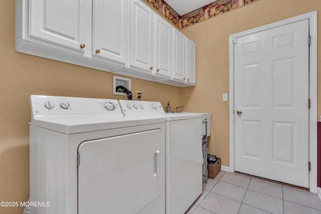 28 Pierhead Dr, Barnegat, NJ 08005 - laundry area with cabinet space, washer and clothes dryer, light tile patterned floors, and baseboards