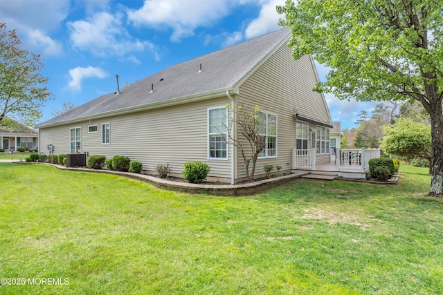 28 Pierhead Dr, Barnegat, NJ 08005 - view of side of home with central AC unit, a wooden deck, and a yard