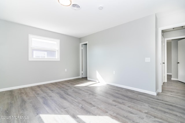 3 Fontana St, Toms River, NJ 08757 - empty room with wood finished floors and baseboards