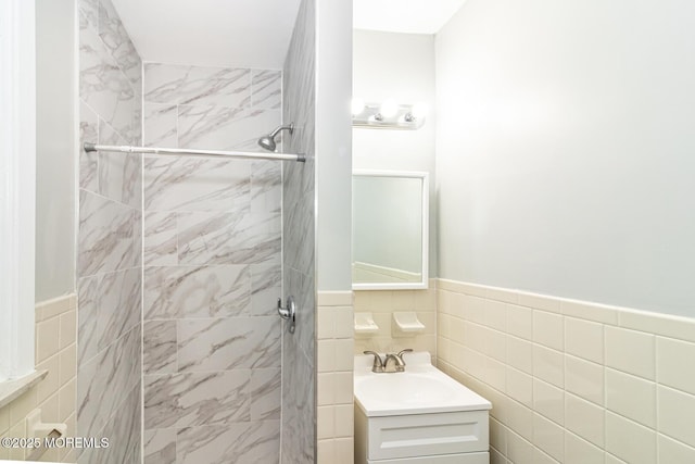 3 Fontana St, Toms River, NJ 08757 - bathroom featuring a stall shower, vanity, tile walls, and a wainscoted wall