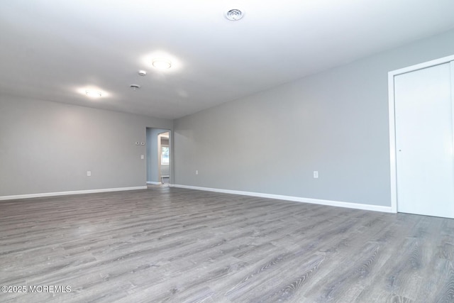 3 Fontana St, Toms River, NJ 08757 - empty room featuring wood finished floors and baseboards