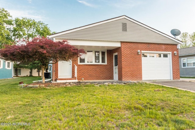 3 Fontana St, Toms River, NJ 08757 - view of front of home featuring brick siding, an attached garage, a front yard, and asphalt driveway