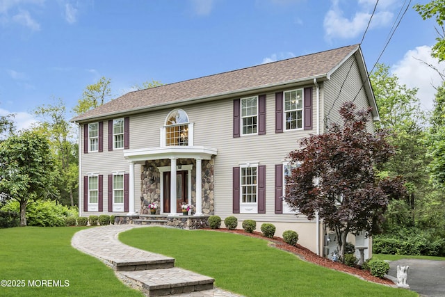 16 W Ave, Gladstone, NJ 07934 - view of front facade featuring a front yard and a shingled roof