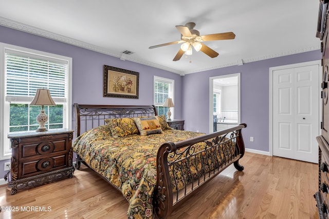 16 W Ave, Gladstone, NJ 07934 - bedroom featuring light wood-type flooring, a ceiling fan, ornamental molding, and connected bathroom