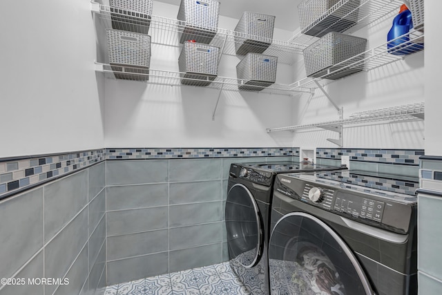 16 W Ave, Gladstone, NJ 07934 - laundry room with washing machine and dryer, tile walls, and wainscoting