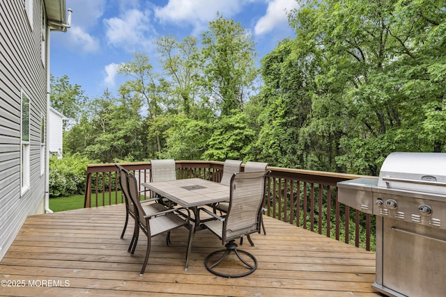 16 W Ave, Gladstone, NJ 07934 - deck featuring grilling area, outdoor dining area, and view of wooded area
