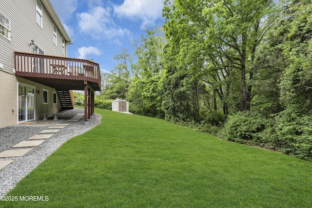 16 W Ave, Gladstone, NJ 07934 - view of green lawn with stairs, a shed, and a wooden deck