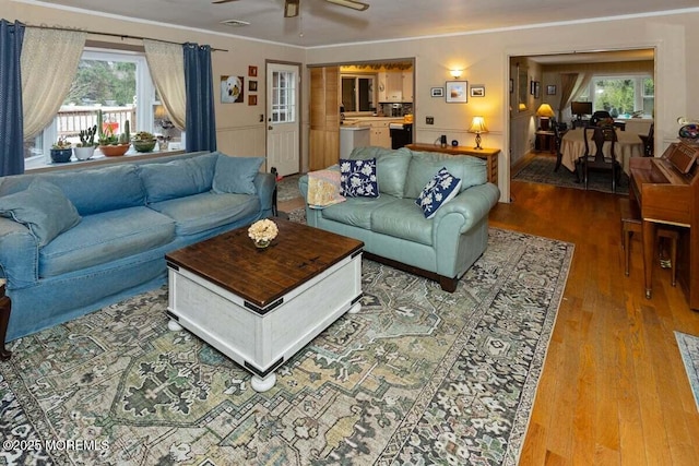 75 Brown Rd, Howell, NJ 07731 - living room featuring wood finished floors, ceiling fan, and crown molding