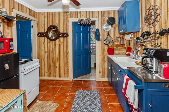 75 Brown Rd, Howell, NJ 07731 - kitchen with blue cabinets, white electric stove, a sink, ceiling fan, and dark tile patterned flooring