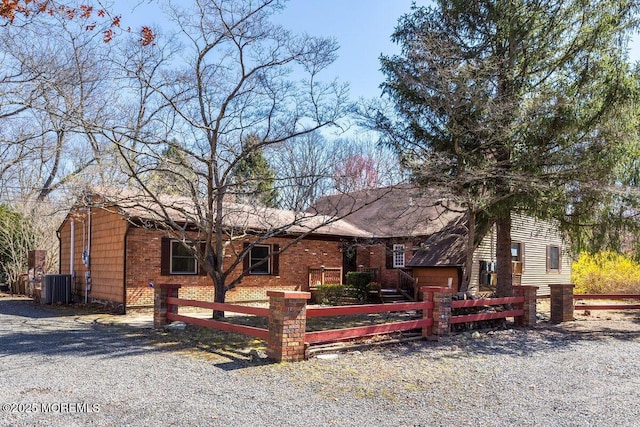75 Brown Rd, Howell, NJ 07731 - view of front of home featuring a fenced front yard and cooling unit