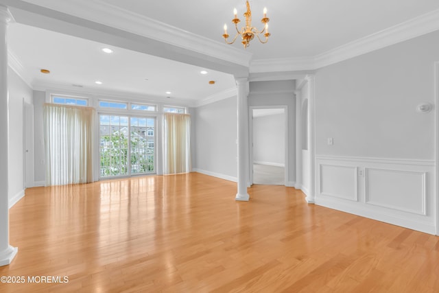 7 Centre St Unit 1303, Ocean Twp, NJ 07712 - empty room featuring decorative columns, crown molding, light wood-style flooring, a chandelier, and recessed lighting
