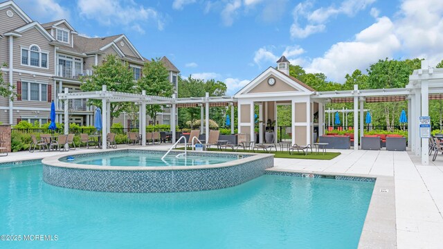 7 Centre St Unit 1303, Ocean Twp, NJ 07712 - view of pool with a pergola, a pool with connected hot tub, and a patio area