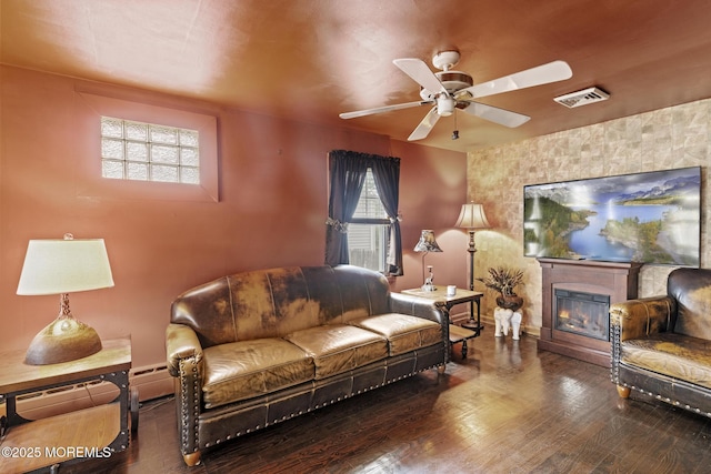388 Atlantic Ave, Long Branch, NJ 07740 - living area featuring a glass covered fireplace, a ceiling fan, wood finished floors, baseboards, and a baseboard heating unit