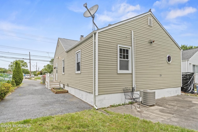388 Atlantic Ave, Long Branch, NJ 07740 - view of home's exterior with a patio and central AC