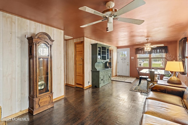 388 Atlantic Ave, Long Branch, NJ 07740 - living area featuring a ceiling fan, wood finished floors, wood walls, and baseboards