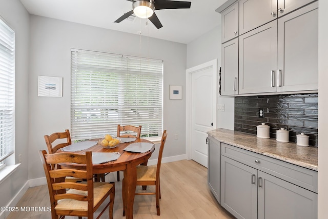 37 Violet Ct, Holmdel, NJ 07733 - dining area featuring light wood-style flooring, ceiling fan, and baseboards