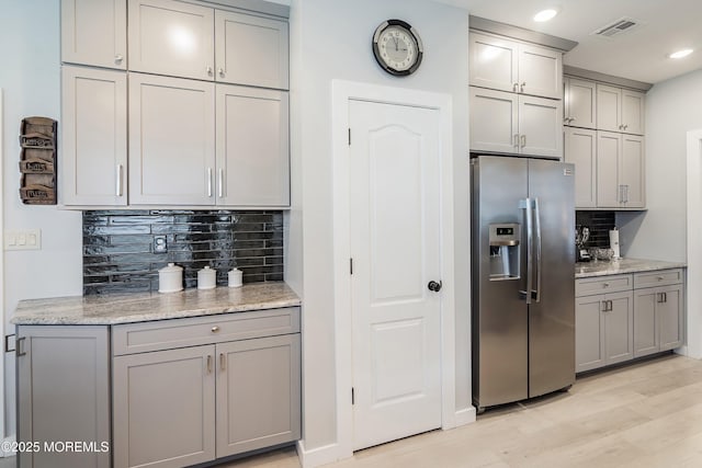 37 Violet Ct, Holmdel, NJ 07733 - kitchen featuring stainless steel refrigerator with ice dispenser, gray cabinetry, tasteful backsplash, light wood-type flooring, and recessed lighting