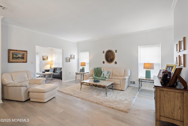 37 Violet Ct, Holmdel, NJ 07733 - living area with ornamental molding, light wood finished floors, plenty of natural light, and baseboards