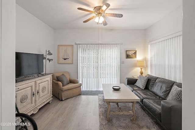 37 Violet Ct, Holmdel, NJ 07733 - living area featuring light wood finished floors and ceiling fan