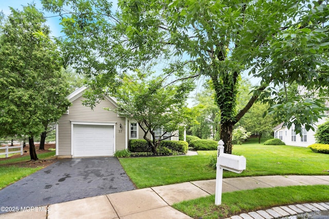 37 Violet Ct, Holmdel, NJ 07733 - view of property hidden behind natural elements featuring a garage and asphalt driveway