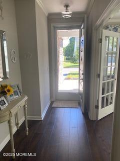 18 Lily Pond Ct, Howell, NJ 07731 - doorway to outside with healthy amount of natural light, crown molding, dark wood-type flooring, and baseboards