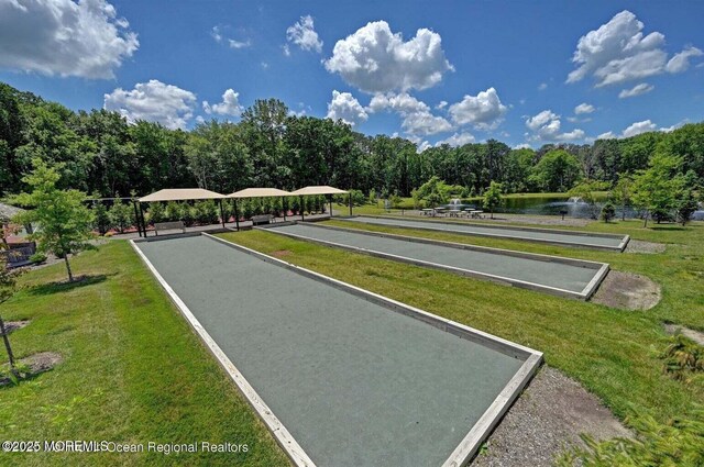 18 Lily Pond Ct, Howell, NJ 07731 - surrounding community with a bocce ball area, a water view, a yard, and a wooded view