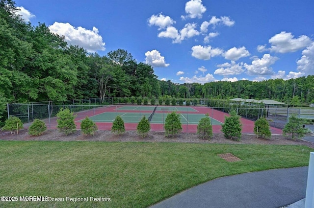 18 Lily Pond Ct, Howell, NJ 07731 - view of tennis court with a forest view