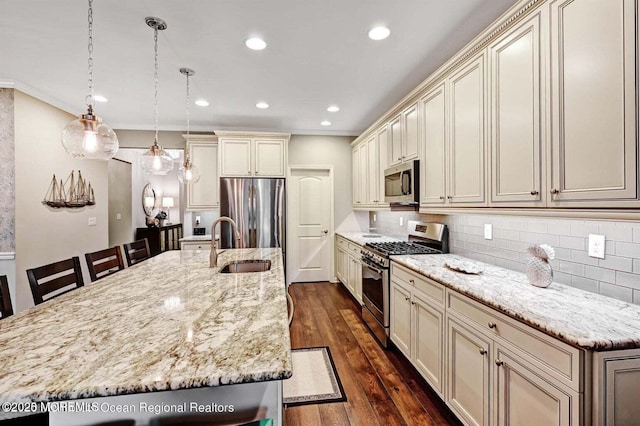 18 Lily Pond Ct, Howell, NJ 07731 - kitchen with stainless steel appliances, cream cabinetry, a sink, tasteful backsplash, and recessed lighting