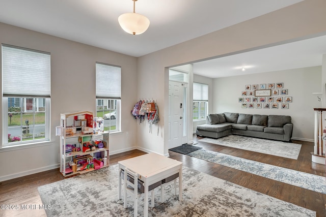 909 Amsterdam Ave, Toms River, NJ 08757 - living room with wood finished floors and baseboards