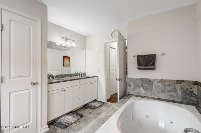909 Amsterdam Ave, Toms River, NJ 08757 - full bathroom with double vanity and a whirlpool tub