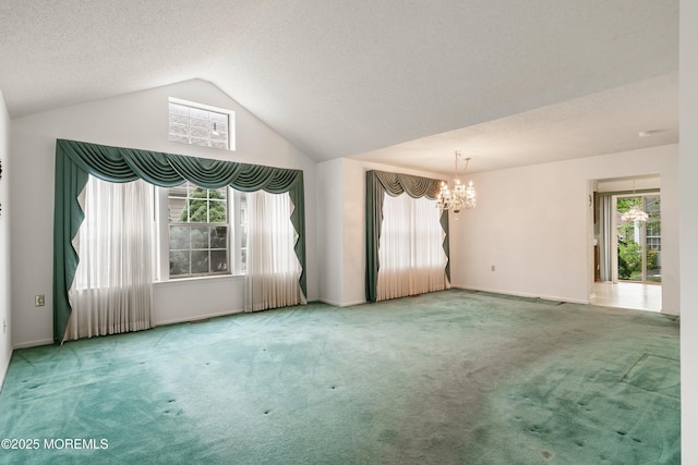 11 Sedgwick Sq, Jackson, NJ 08527 - unfurnished room with a chandelier, carpet floors, lofted ceiling, baseboards, and a textured ceiling