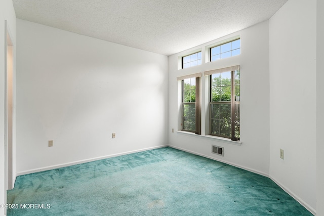 11 Sedgwick Sq, Jackson, NJ 08527 - empty room featuring carpet flooring, a textured ceiling, and baseboards
