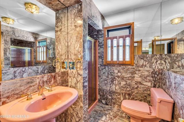 36 Stoney Creek Ln, Colts Neck, NJ 07722 - full bathroom with tile walls, a sink, a stall shower, toilet, and marble tiled floors