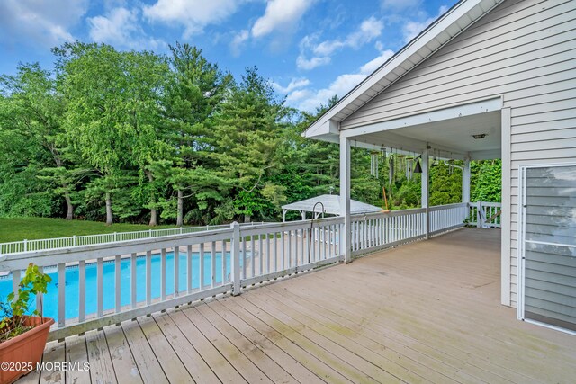 36 Stoney Creek Ln, Colts Neck, NJ 07722 - view of pool featuring a deck and view of scattered trees