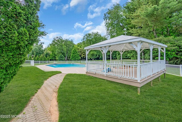 36 Stoney Creek Ln, Colts Neck, NJ 07722 - view of pool with a gazebo, a deck, and view of wooded area