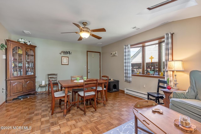 7 Monterey Dr, Hazlet, NJ 07730 - dining room with ceiling fan, baseboard heating, baseboards, and a skylight