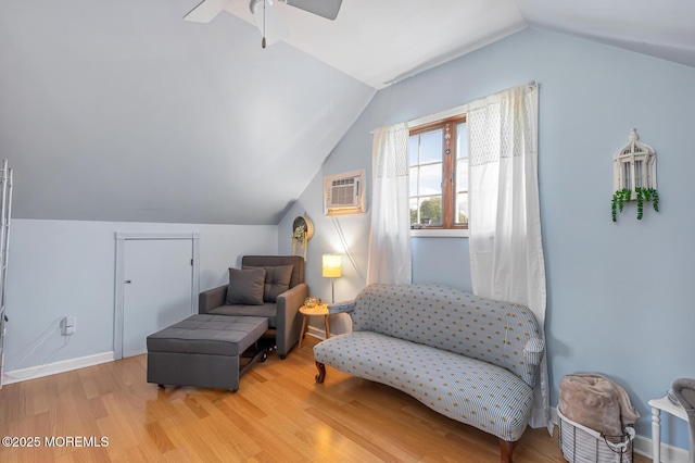 7 Monterey Dr, Hazlet, NJ 07730 - sitting room with vaulted ceiling, wood finished floors, a wall mounted air conditioner, and a ceiling fan