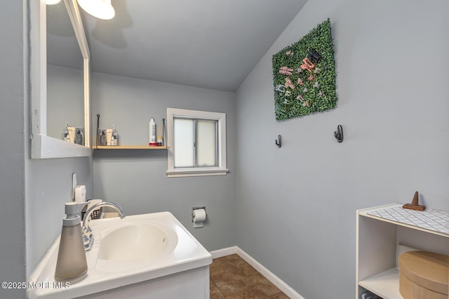 7 Monterey Dr, Hazlet, NJ 07730 - bathroom featuring vanity, vaulted ceiling, and baseboards