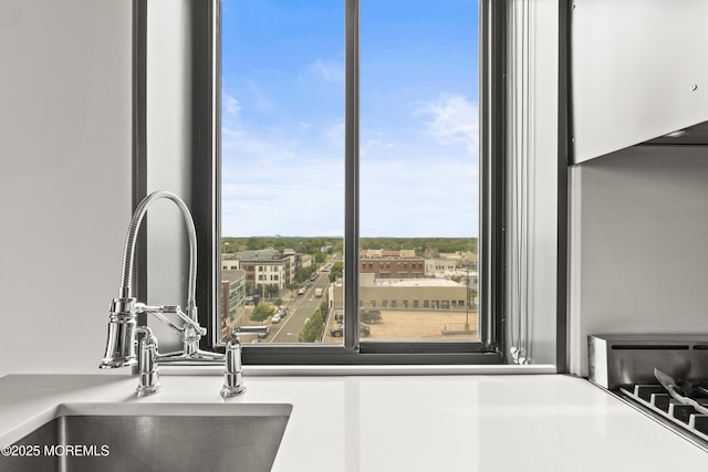 601 Bangs Ave Unit 701, Asbury Park, NJ 07712 - kitchen view of a sink and white cabinetry