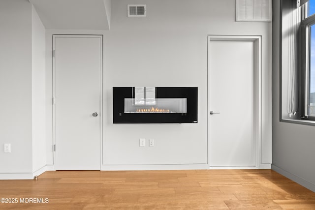 601 Bangs Ave Unit 701, Asbury Park, NJ 07712 - unfurnished bedroom with wood finished floors